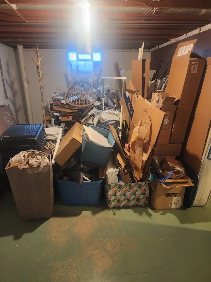 Roll-off dumpster container at job site for 4 Yard Dumpster Rental in New Castle